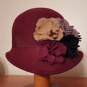 Burgundy bowler with felt embellishment
